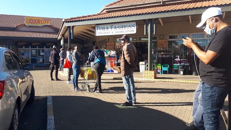 A queue of about 20 people outside Liquor City at the Sophiatown Shopping Complex. Two individuals who preferred not to be named said that they specifically woke up early to come and queue. "We are planning on getting cases of beer, we just hope that they won't limit quantities too much because we don't want to have to come here again tomorrow.
