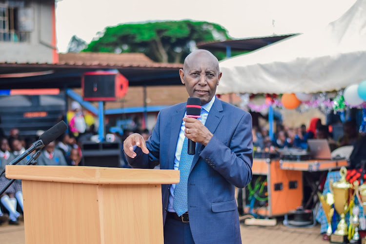 Limuru MP John Kiragu speaking at Limuru town school during the prize giving day.