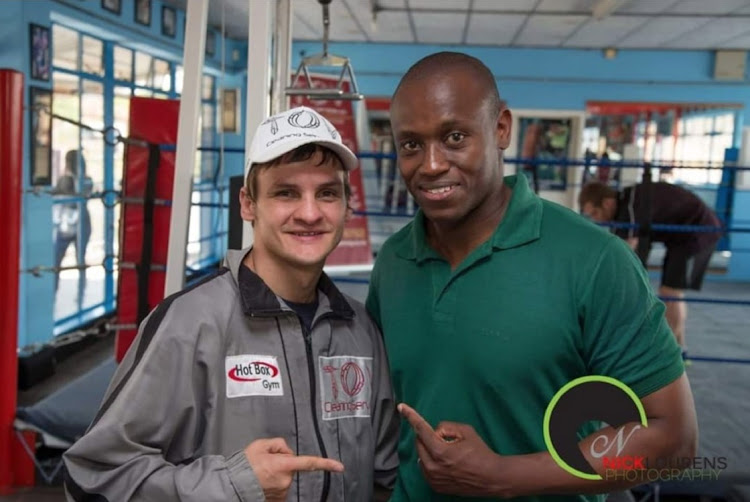 Hekkie Budler with promoter Cyril Lehong who will stage Budler"s comeback fight in May.