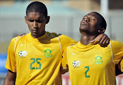South African national U20 midfielders Morne Nel and Madisha Motjeka (R).