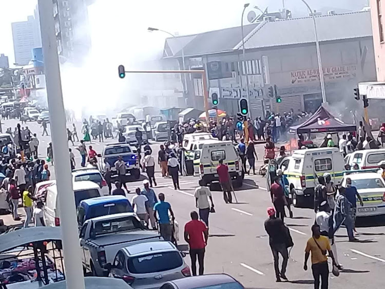 Police have responded to a protest in central Durban on Monday after fires were reported on a road and a shop was set alight.