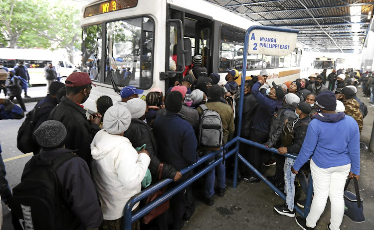 Commuters queue to board a Golden Arrow bus in Cape Town. File Picture: Esa Alexander/Sunday Times.