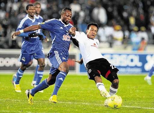 Kasusula Kilicho and Tlou Segolela during the CAF Champions League match between Orlando Pirates and TP Mazembe at Orlando Stadium on April 20. CAF have fined Mazembe after the referee was assaulted
