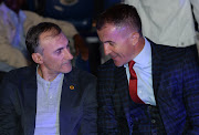 Kaizer Chiefs' coach Giovanni Solinas (L) chats to his Orlando Pirates counterpartizer Chiefs and Milutin Sredojević during the Telkom Knockout draw at SuperSport studios in Randburg, north of Johannesburg, on October 8, 2018.   