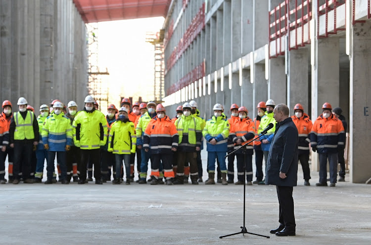 Russian President Vladimir Putin visits the construction site of the National Space Agency on the premises of the Khrunichev State Research and Production Space Centre, in Moscow, Russia, February 27 2022. Picture: SPUTNIK/ALEKSEY NIKOLSKY/REUTERS