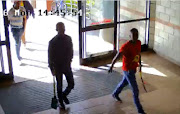 CCTV footage caught eight men entering the building at the main Nelson Mandela Metropolitan University carrying a variety of weapons.
Image by: Screengrab /Video Supplied