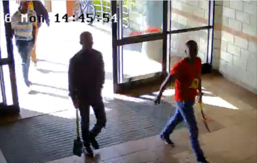 CCTV footage caught eight men entering the building at the main Nelson Mandela Metropolitan University carrying a variety of weapons. Image by: Screengrab /Video Supplied