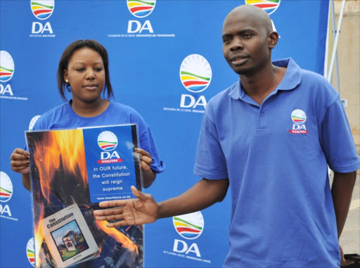 DA Youth members protesting at Constitution Hill on March 26, 2012 in Johannesburg, South Africa. They staged a sit-in to highlight the current threats to the Constitution and DA Youth Leader Makashule Gana and chairperson Mbali Ntuli were present.