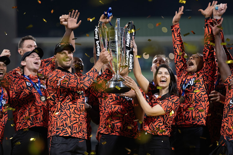 Sunrisers Eastern Cape captain Aiden Markram and franchise owner Kavya Maran lift the SA20 trophy as they celebrate with the team oat Newlands in Cape Town. Picture: NIC BOTHMA