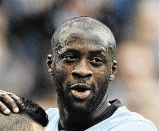 BACK ON TRACK: Manchester City midfielder Yaya Toure was proud of the team spirirt yesterday