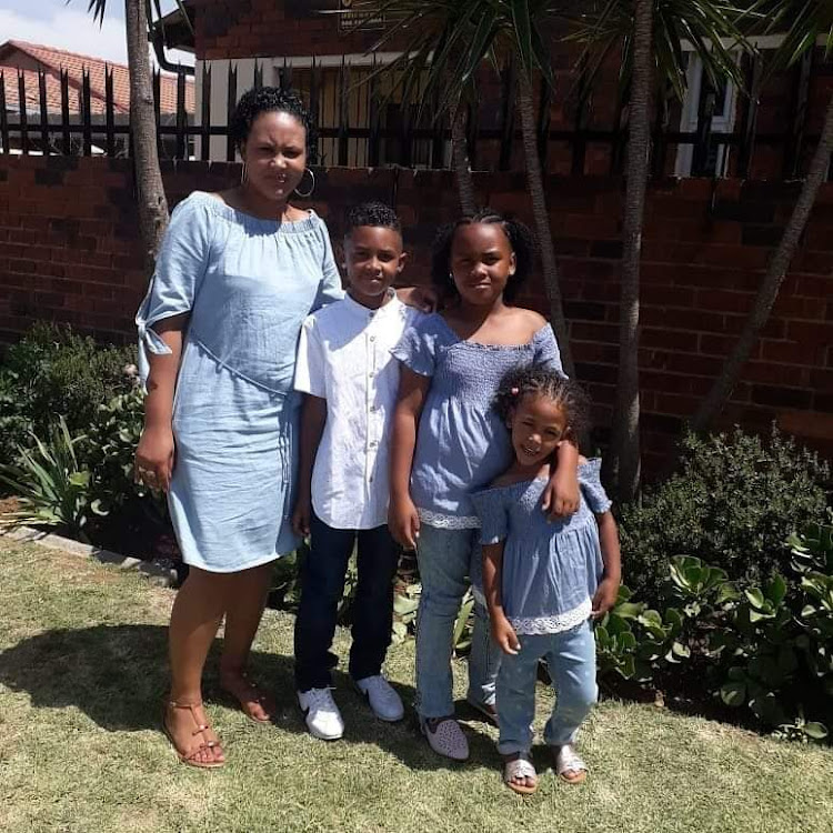 Odile Goodall with her children Lashay, Learyn and Aiden. The children died in a taxi crash in March.