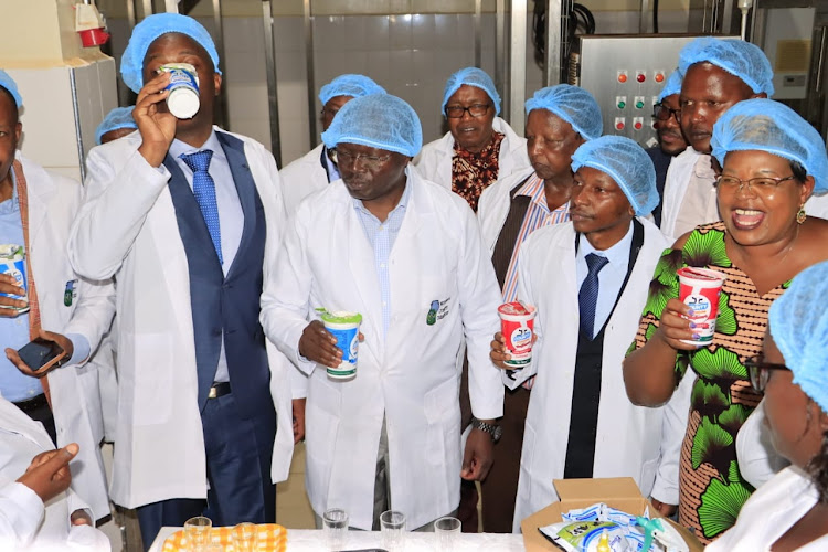 Murang'a leaders sample some of the products produced by Murang'a County Creameries plant on March 30, 2024.