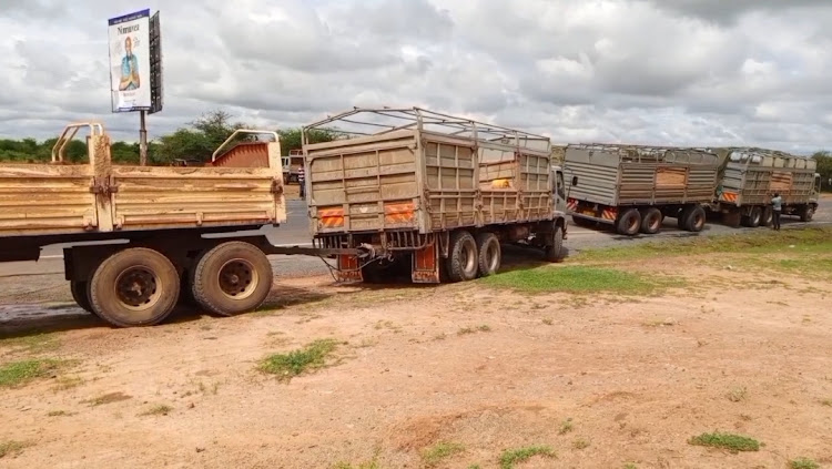 Trucks transport sand from Kitui at the Kanyonyoo checkpoint along the Nairobi-Garissa highway