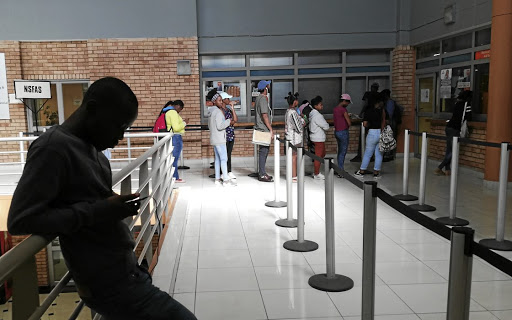 Students line up at an NSFAS office at a Johannesburg campus.