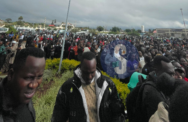 Hundreds of mourners turn up for collection of the body of TikToker Brian Chira at the Kenyatta University mortuary for burial at the family home in Gathanje, Ingitei village, Githunguri in Kiambu County, March 26, 2024.