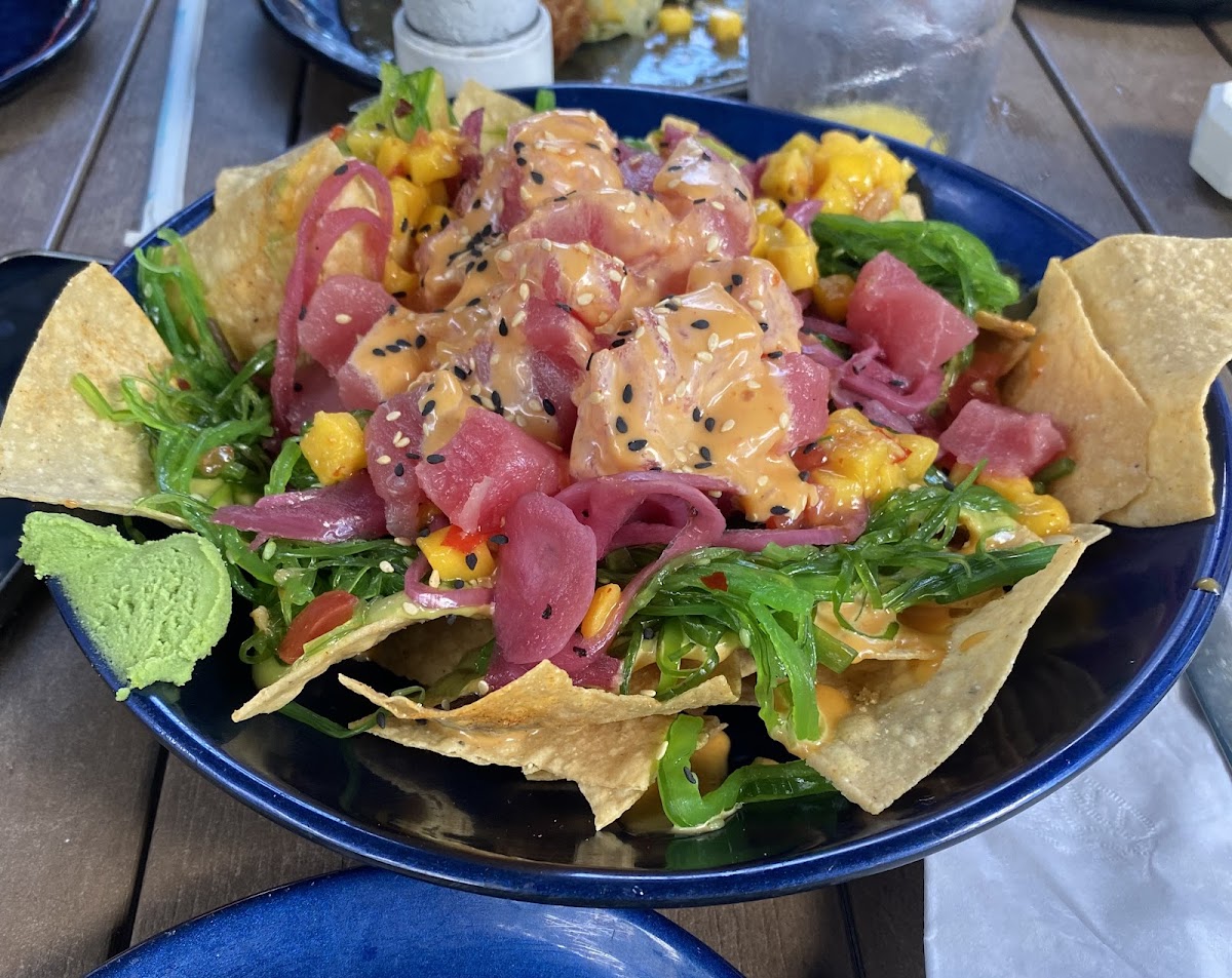 Poke nachos with corn chips