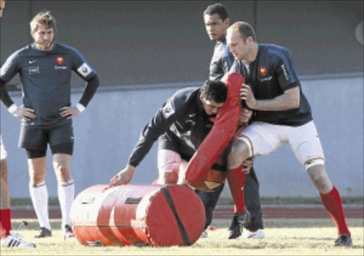 HEFTY: French rugby union players (L-R) Maxime Medard, Maxime Mermoz, Thierry Dusautoir and Julien Bonnaire in training. France face Scotland in the Six Nations championship at Murrayfield on Sunday. PHOTO: REUTERS