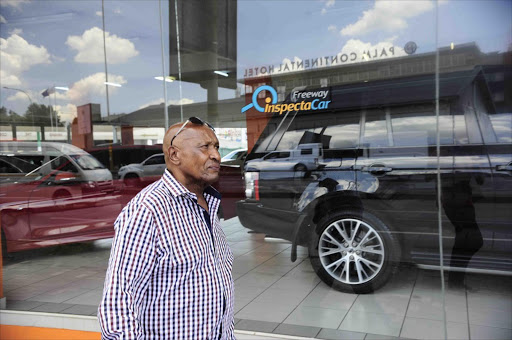November 29, 2016. McDonald Twala from Protea North is trying to recoup his money from Freeway Inspecta Car in Crown Mines, Johannesburg after he decided to cancel buying a car for his daughter. Pic: Thulani Mbele. © Sowetan
