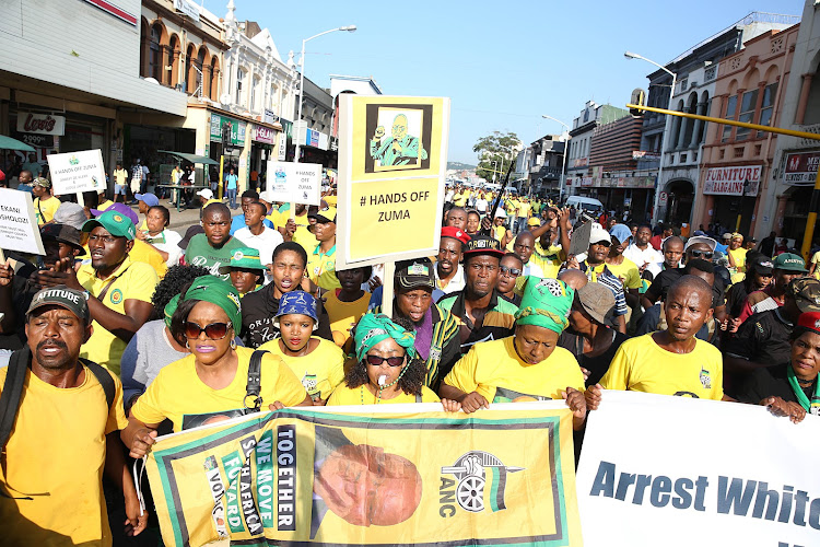 Jacob Zuma supporters marching to Durban high court ahead of his appearance on corruption charges.