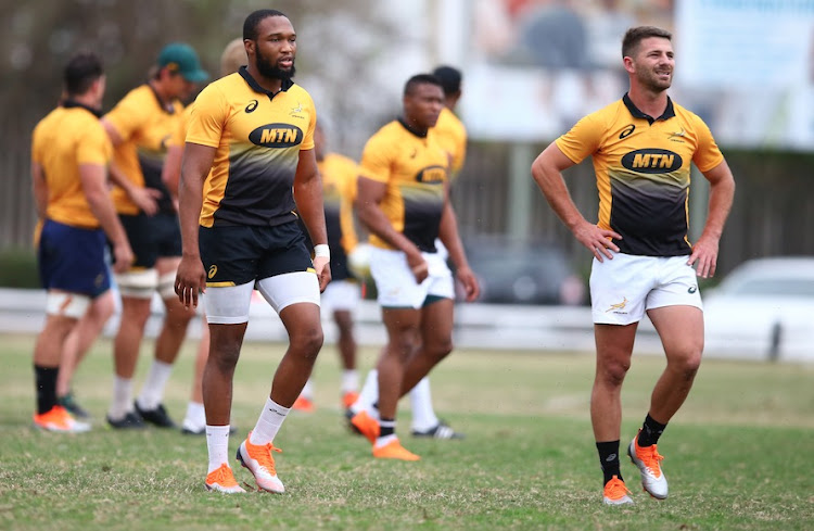 Lukhanyo Am with Willie le Roux during the South African national rugby team training session at Jonsson Kings Park on August 14, 2018 in Durban, South Africa.