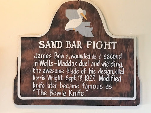 James Bowie, wounded as a second in Well-Maddox duel and wielding, the awesome blade of his design, killed Norris Wright Sept. 19, 1827. Modified knife later became famous as "The Bowie Knife."