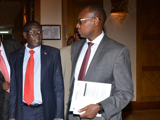 CA director general Francis Wangusi and other officials with Media Council of Kenya Chairman Charles Kerich at the launch of election reporting guidelines at Hotel Intercontinental, Nairobi on Tuesday, March 7. /PATRICK VIDIJA