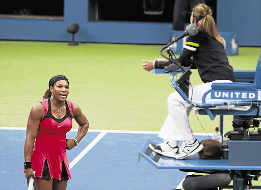 Serena Williams argues with the umpire during her match against Samantha Stosur of Australia in the final at the US Open in New York on Sunday Picture: JESSICA RINALDI/REUTERS