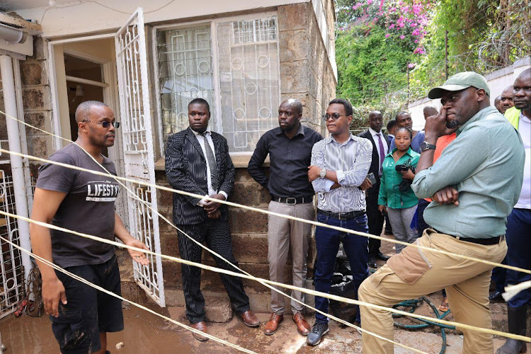 Nairobi governor Johnson Sakaja together with county officials listening to concerns of a CIty resident regarding flooding. He toured parts of Kileleshwa, Kilimani and Kawagware where some of the residents were affected with floods following the heavy downpours on April 22, 2024.