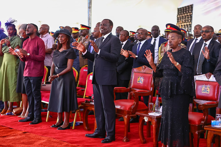 President William Ruto, First Lady Mama Rachel Ruto and the family of the late CDF General Francis Ogolla during the burial ceremony at his home at Ngiya Village in Siaya County on April 21, 2024.