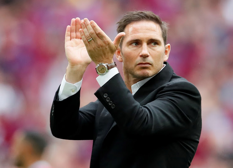 Derby County manager Frank Lampard applauds crowd and looks dejected after the match in May 2019.