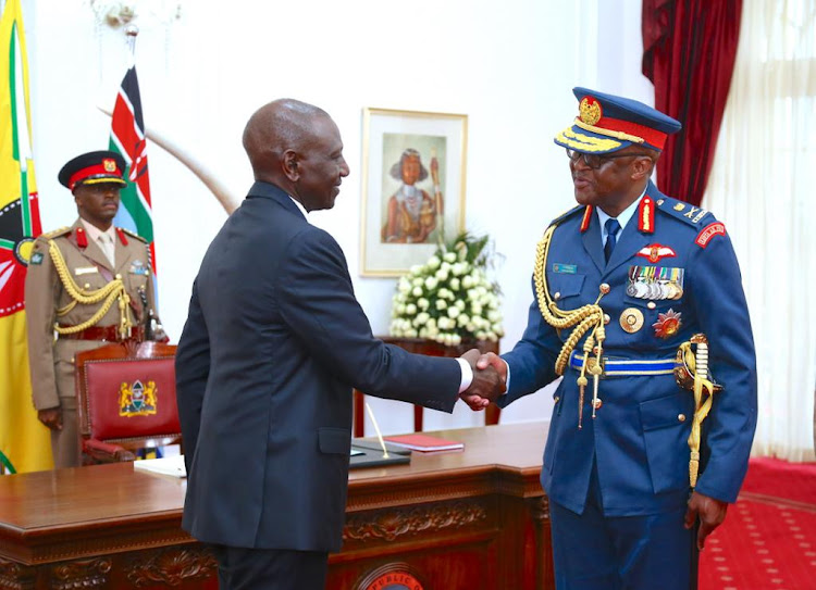 President William Ruto and the new Chief of Defence Forces General Francis Omondi Ogolla during Swearing in at State House, April 29, 2023.