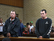 Willem Oosthuizen and Theo Martins during their   court appearance for the infamous coffin case yesterday .  Photo: Veli  Nhlapo