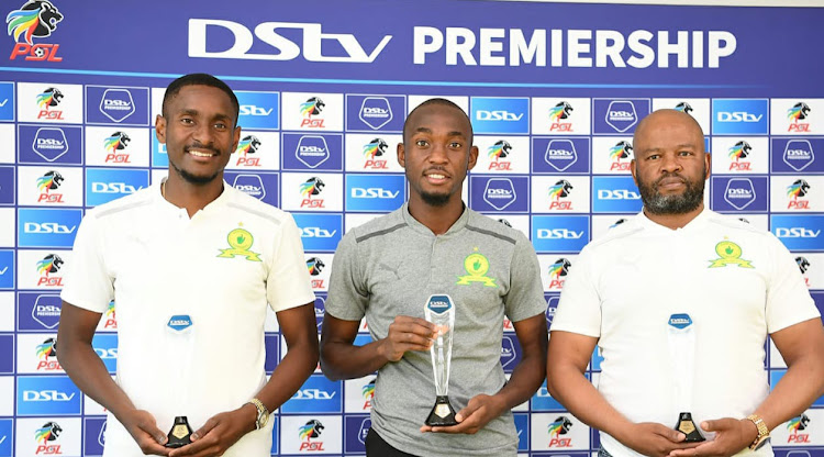 Mamelodi Sundowns striker Peter Shalulile is flanked by his co-coaches Manqoba Mnqgithi (right) and Rulani Mokwena after receiving their monthly PSL Awards.