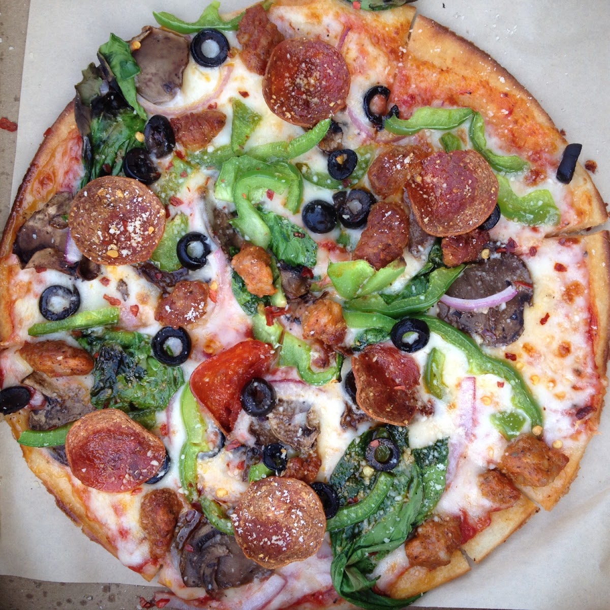 The glutenfree lineage(pepperoni, sausage, olives, peppers, mushrooms) plus garlic and spinach