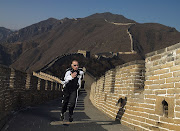 Jeremy Wariner of the US runs on the Great Wall of China.