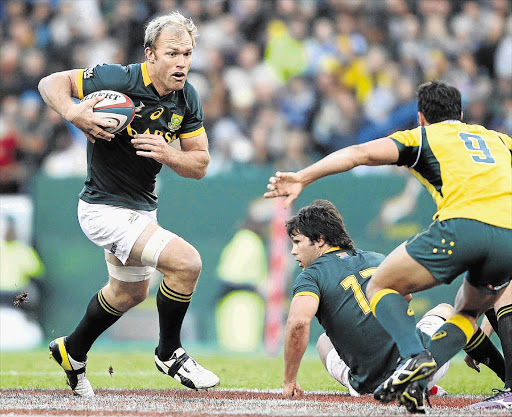 FULL THROTTLE: Schalk Burger during Saturday's match against Australia at Newlands in Cape Town. Burger returned to the national squad last week after joining Suntory Sungoliath in Japan