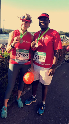 Sky News reporter Alex Crawford with Vusi Gumede, head of the Thabo Mbeki African Leadership Institute, after they finished the Two Oceans Half Marathon in Cape Town on Saturday.