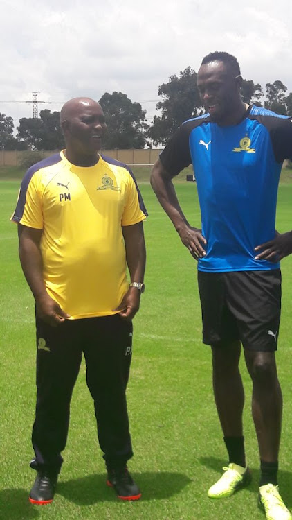 Retired Jamaican athletic superstar Usain Bolt and Mamelodi Sundowns coach Pitso Mosimane.