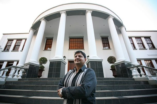 Atul Gupta, at the bottom of the steps to his Saxonwold, Johannesburg home. Pic: KEVIN SUTHERLAND.