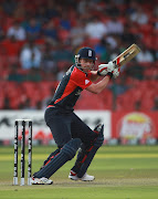 Paul Collingwood of England hits out during the 2011 ICC World Cup Group B match between England and Ireland at the M. Chinnaswamy Stadium on March 2, 2011 in Bangalore, India