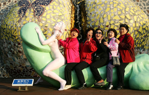 People visit the theme park 'Love Land' in Jeju, South Korea. Taiwan's 'Romantic Boulevard' hopes to achieve similar success.