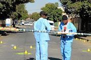 Crime scene detectives counted 54 spent cartridges  in Brakpan, east of Johannesburg, yesterday after taxi association guards opened fire at a group of taxi drivers. 