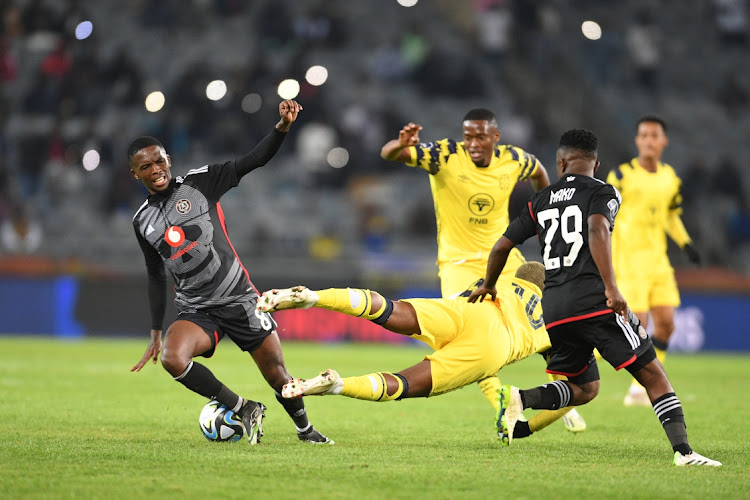 Thabang Monare of Orlando Pirates and Khanyisa Mayo of Cape Town City FC during the DStv Premiership match between Orlando Pirates and Cape Town City FC at Orlando Stadium on Tuesday
