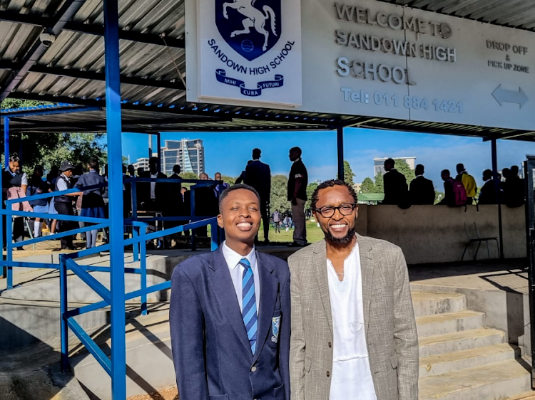 Grade 11 pupil Art Mathibela, 16, with his father, 43-year-old actuary Mbongeni Mathibela, outside Sandown High School in Sandton on Wednesday.