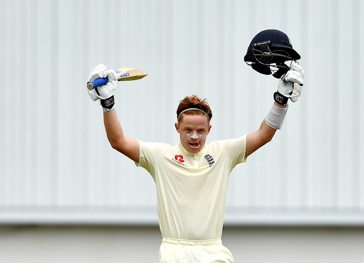 Ollie Pope of England celebrates after scoring 100 runs on day 2 of the third Test match against South Africa at St Georges Park on January 17.