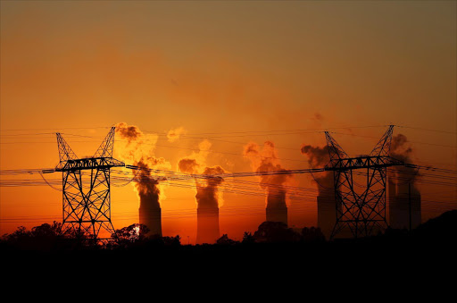 Electricity pylons at an Eskom coal-burning power station near Sasolburg. Picture: REUTERS/SIPHIWE SIBEKO