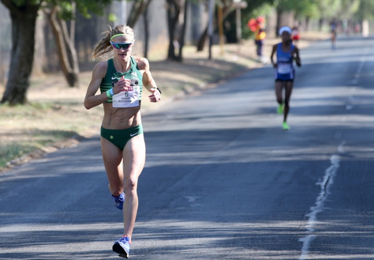 Irvette van Zyl in the lead followed by Kesa Molotsane during the Spar Women's Challenge at Marks Park Sports Club on October 07, 2018 in Johannesburg, South Africa.