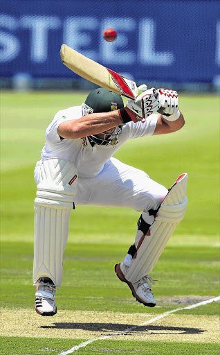 Jacques Kallis ducks under a bouncer from Pat Cummins of Australia at the Wanderers yesterday. Kallis scored 54 runs to take his test total to 12003 Picture: DUIF DU TOIT/GALLO IMAGES