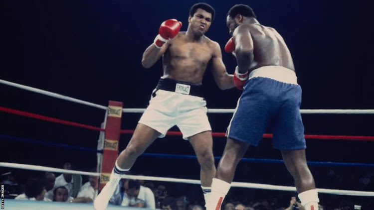 Muhammad Ali (left) and Joe Frazier in a boxing match