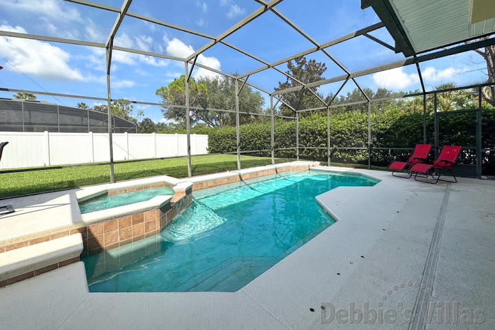 Sunny west-facing private pool deck at this West Haven vacation villa